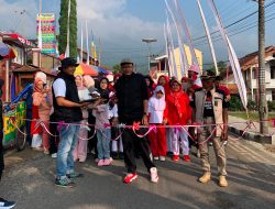 H. Asep Peri Herdiana, bersama istrinya, Hj. Ida Farida Fery, menggelar pertandingan bola voli dan jalan santai dengan berbagai doorprize